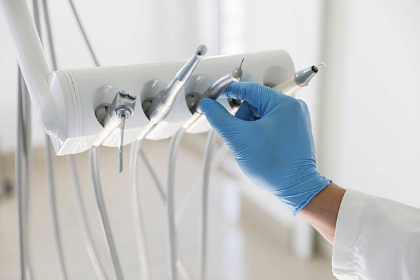 Professional Tooth Extraction technician working in Myrtle Grove, NC